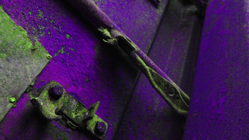 Purple and Green Metal Surface — Dramatic