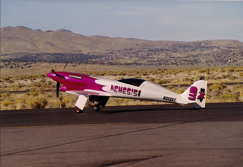 Purple and White Airplane — Desert
