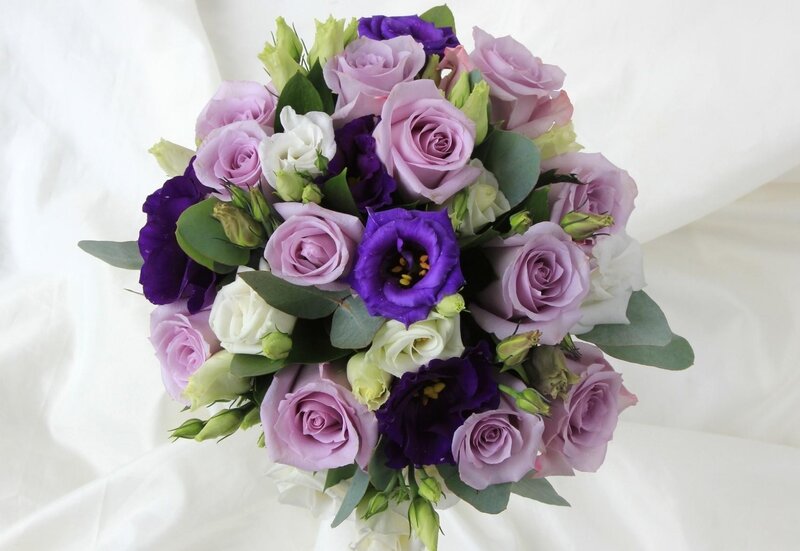 purple and white flower bouquet