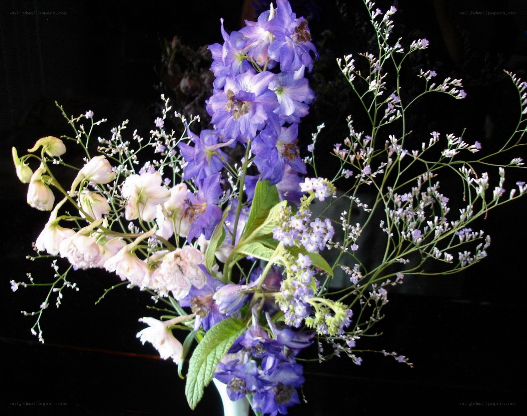 purple and white flower bouquet