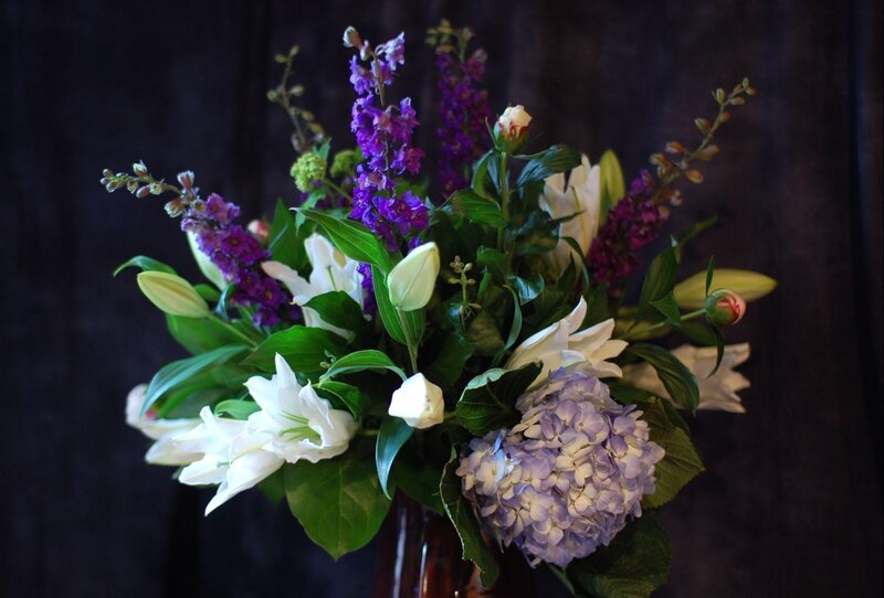 purple and white flower bouquet