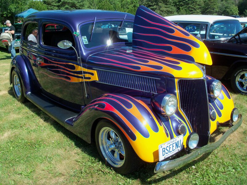 Purple and yellow flame custom car