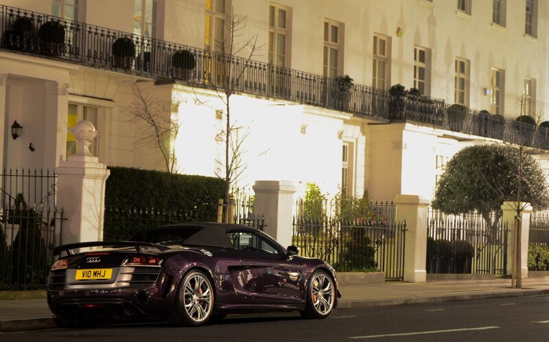 Purple Audi R8 on a city street