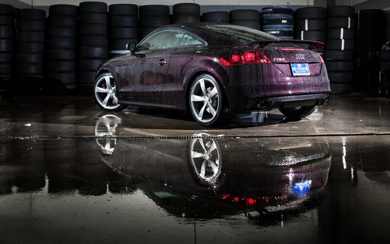 Purple Audi TT in wet garage