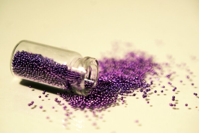 Purple Beads in a Bottle