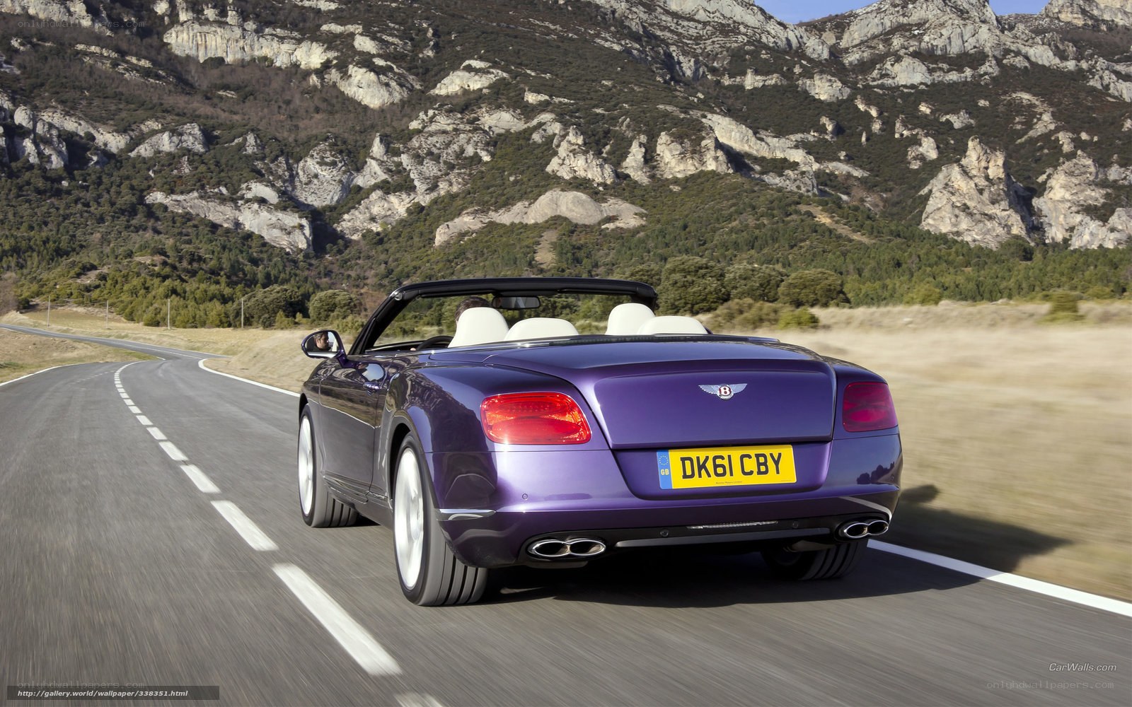 Purple Bentley on mountain road
