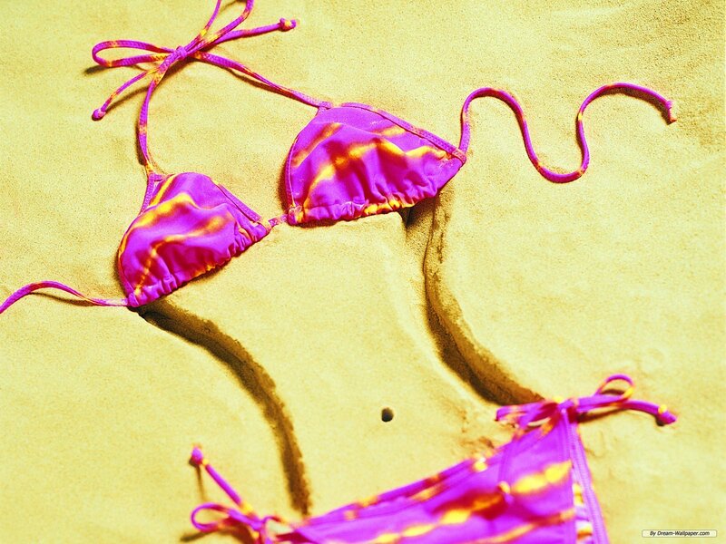purple bikini on sand