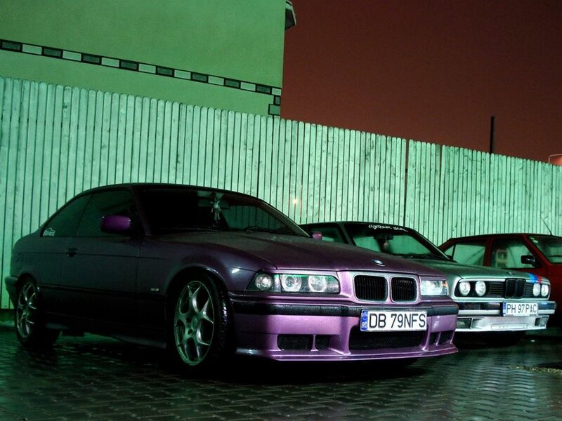 Purple BMW cars at night