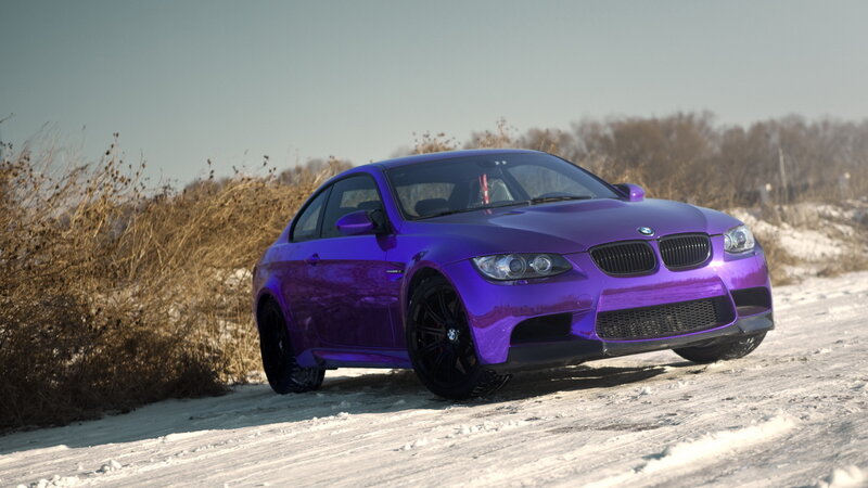 Purple BMW M3 on snowy road