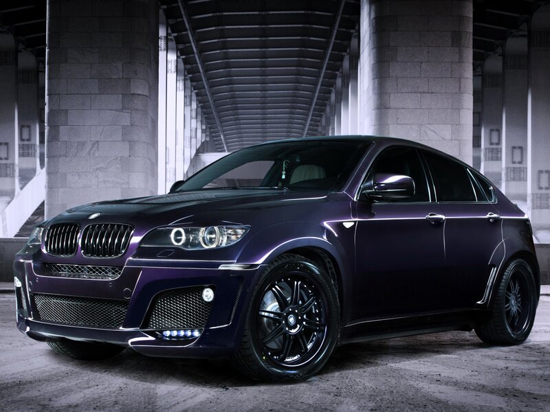 Purple BMW X6 in urban setting