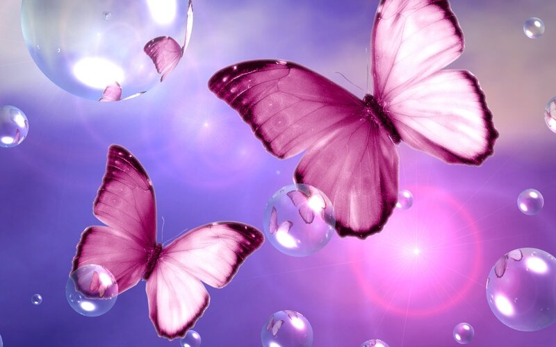 Purple butterflies in a dreamy sky