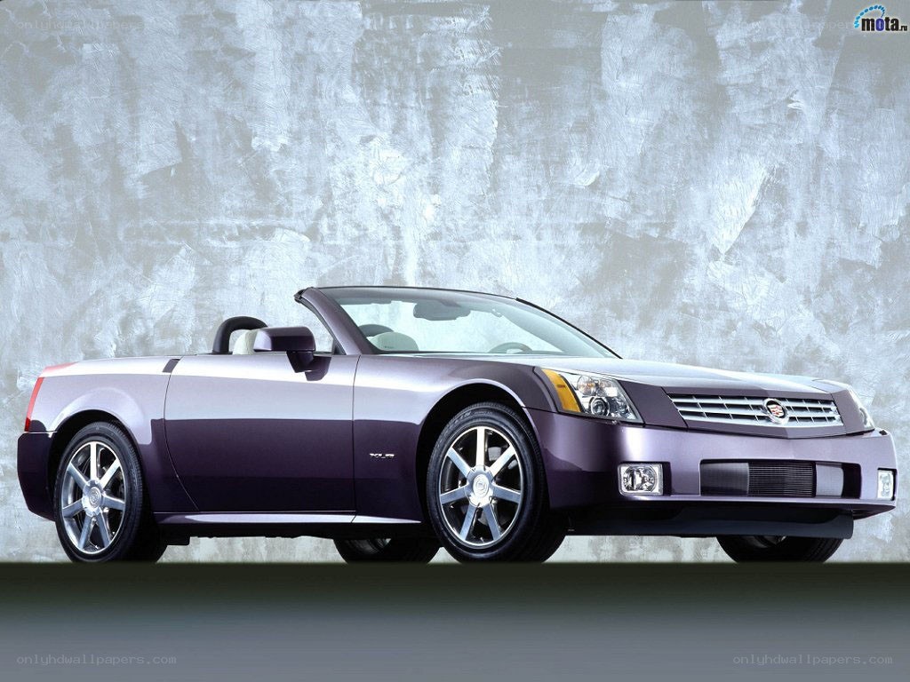 purple cadillac convertible