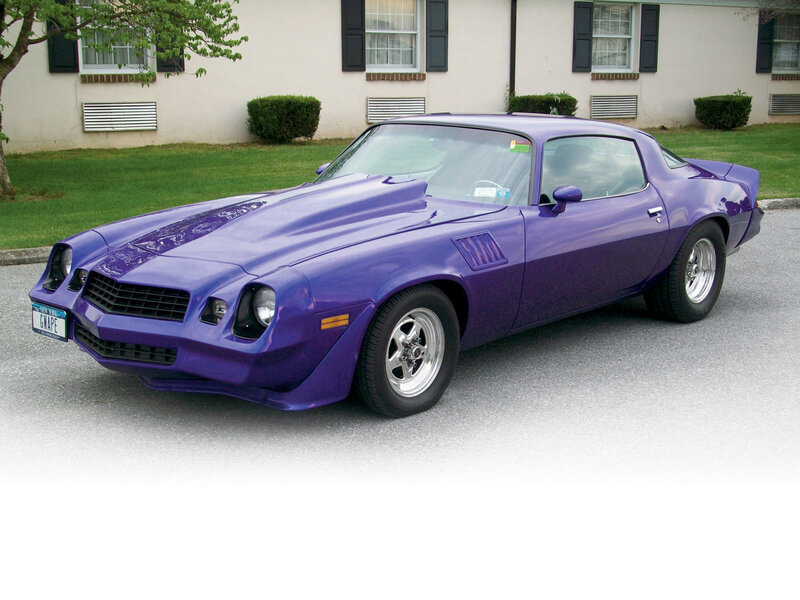 Purple Camaro parked on street