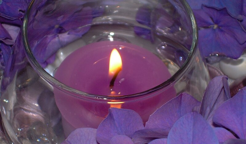 Purple Candle in Glass