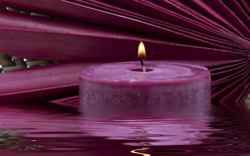 Purple Candle in Water