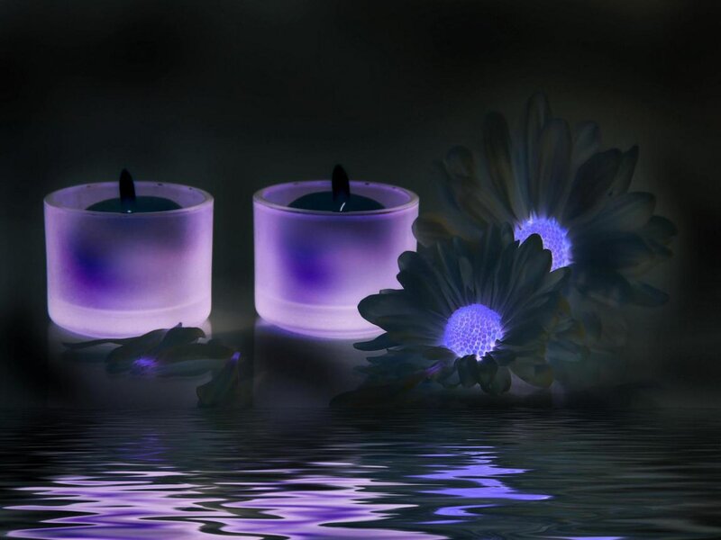 Purple candles and flowers