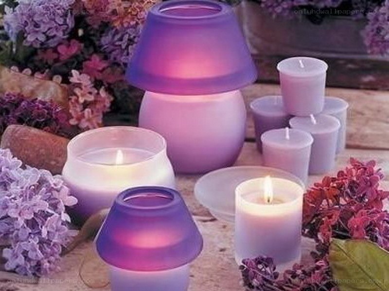 purple candles with flowers