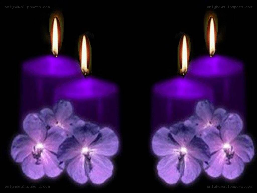 purple candles with flowers