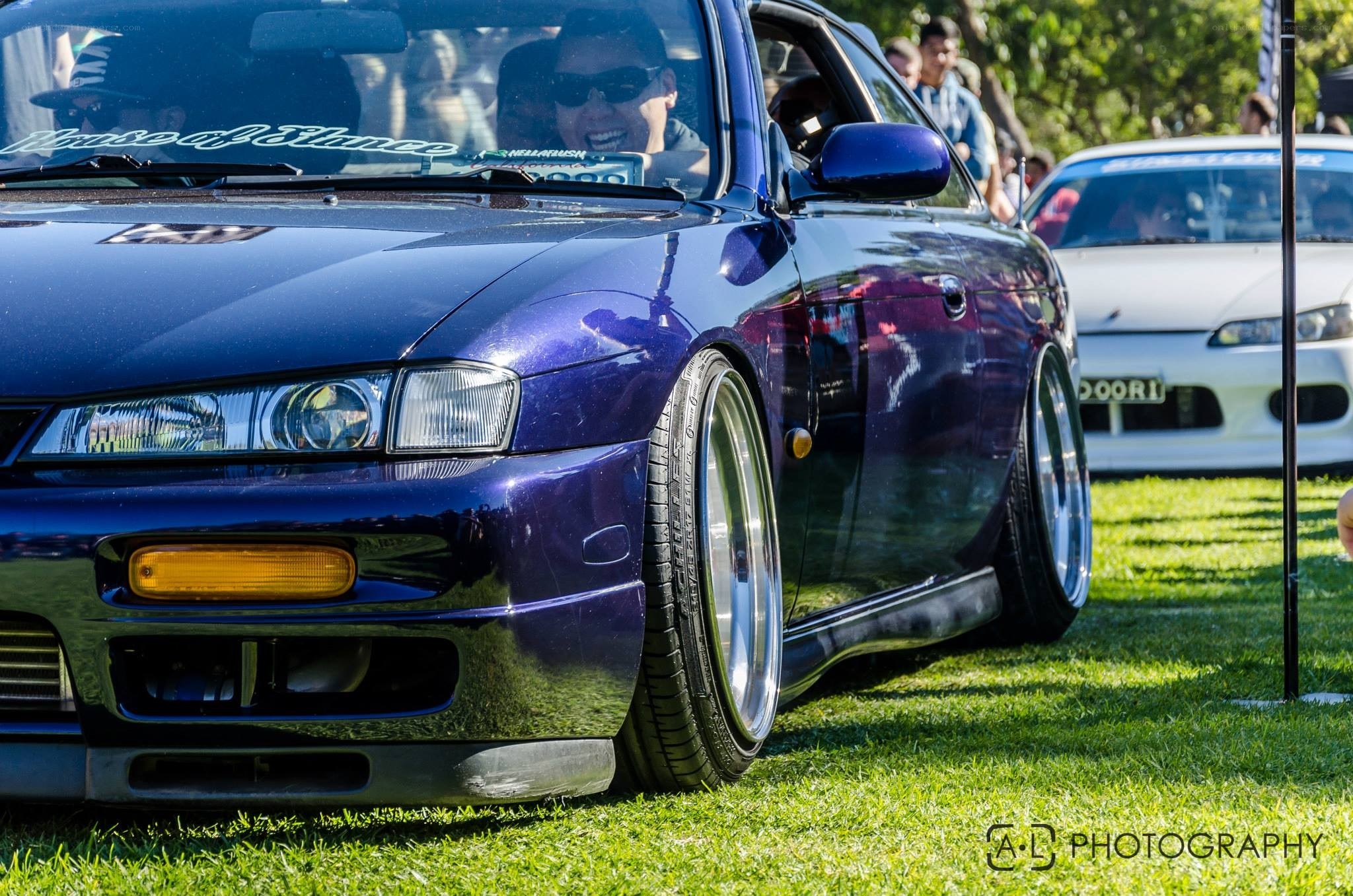 Purple car at a show