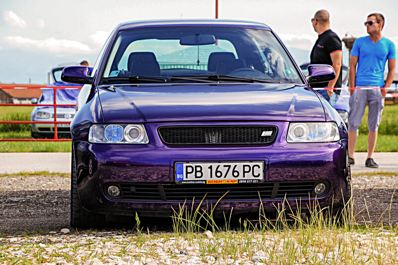 Purple Car at Outdoor Event