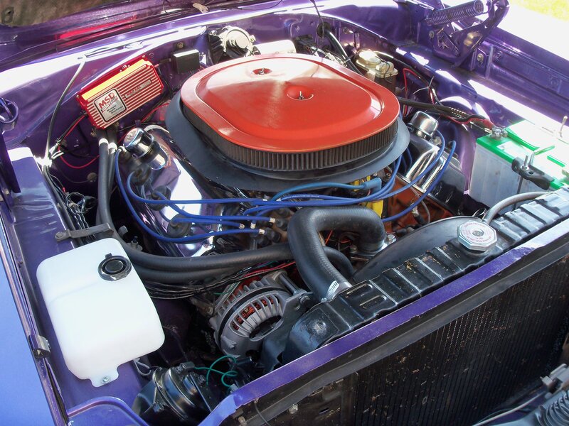 purple car engine bay