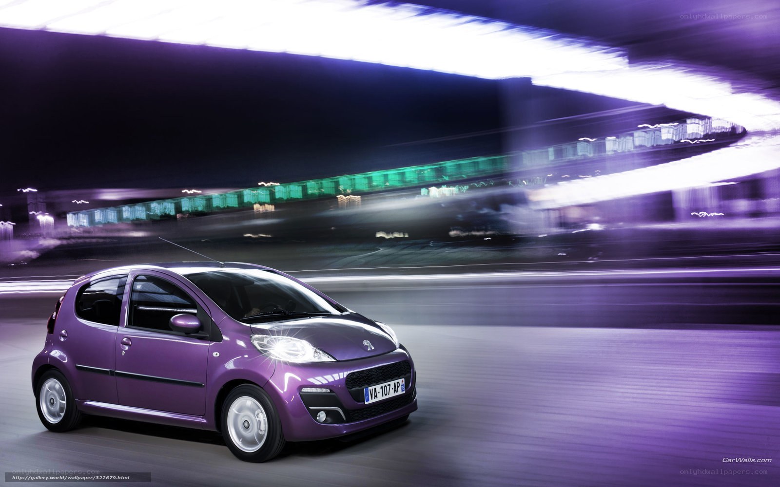 Purple car in motion at night