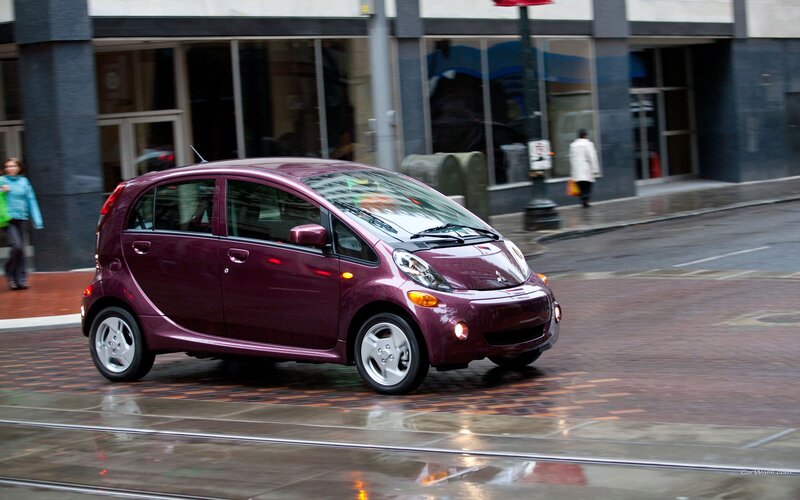 Purple car on city street