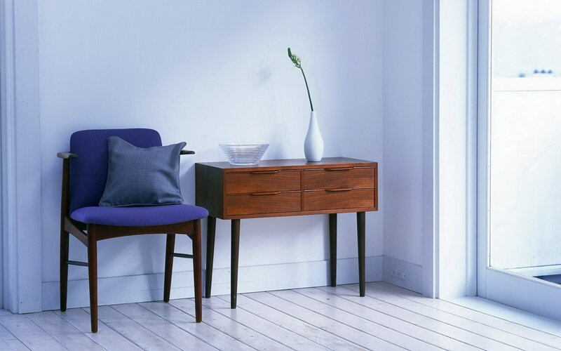 Purple chair and wooden console