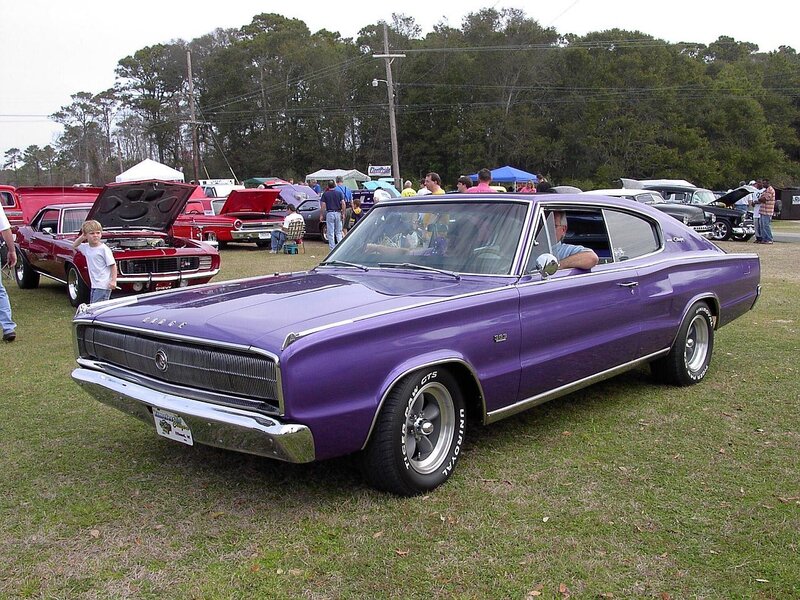 Purple classic car at a show