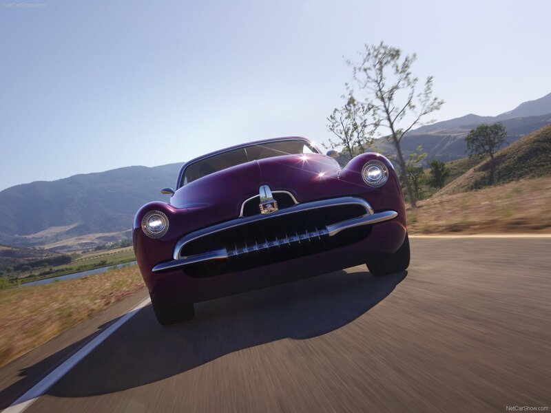 Purple classic car on a road