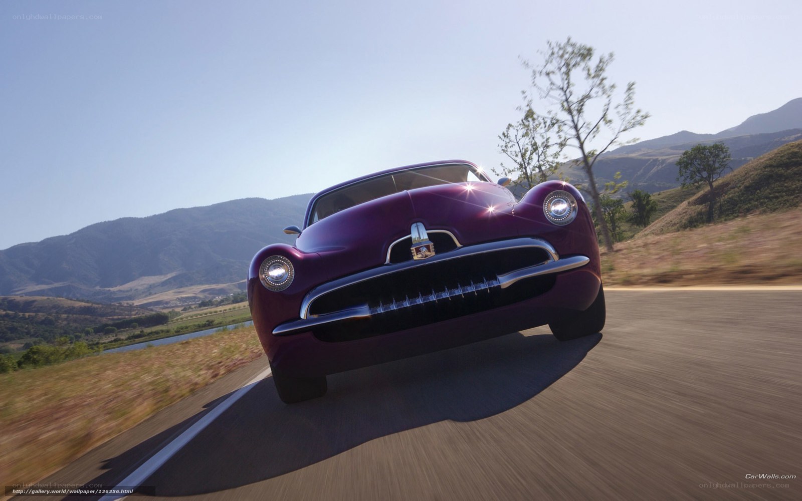 Purple classic car on a road