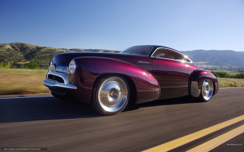 Purple classic car on road