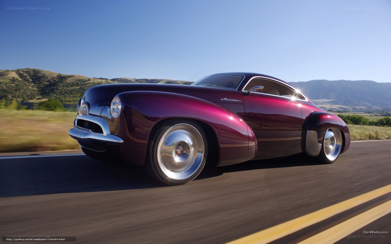 Purple classic car on road