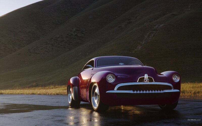 Purple classic car on wet road