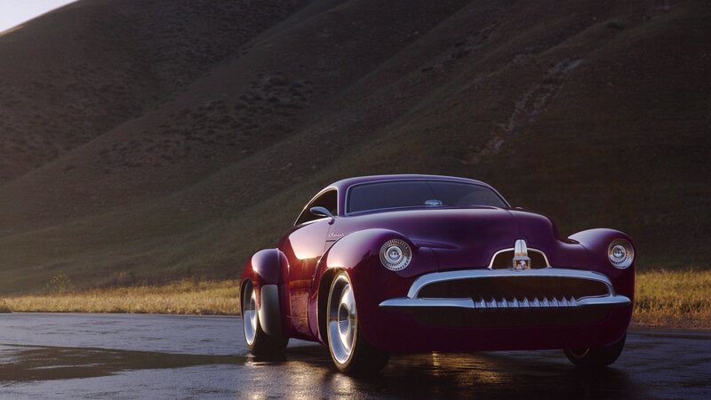 Purple classic car on wet road