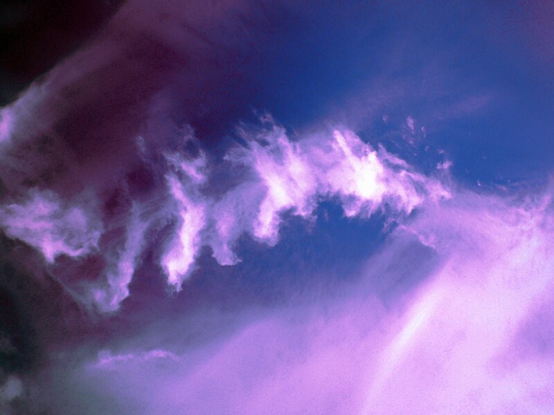 Purple Clouds in Sky — Dramatic