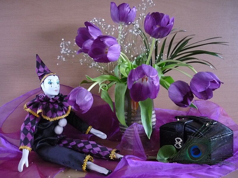 Purple clown doll with flowers