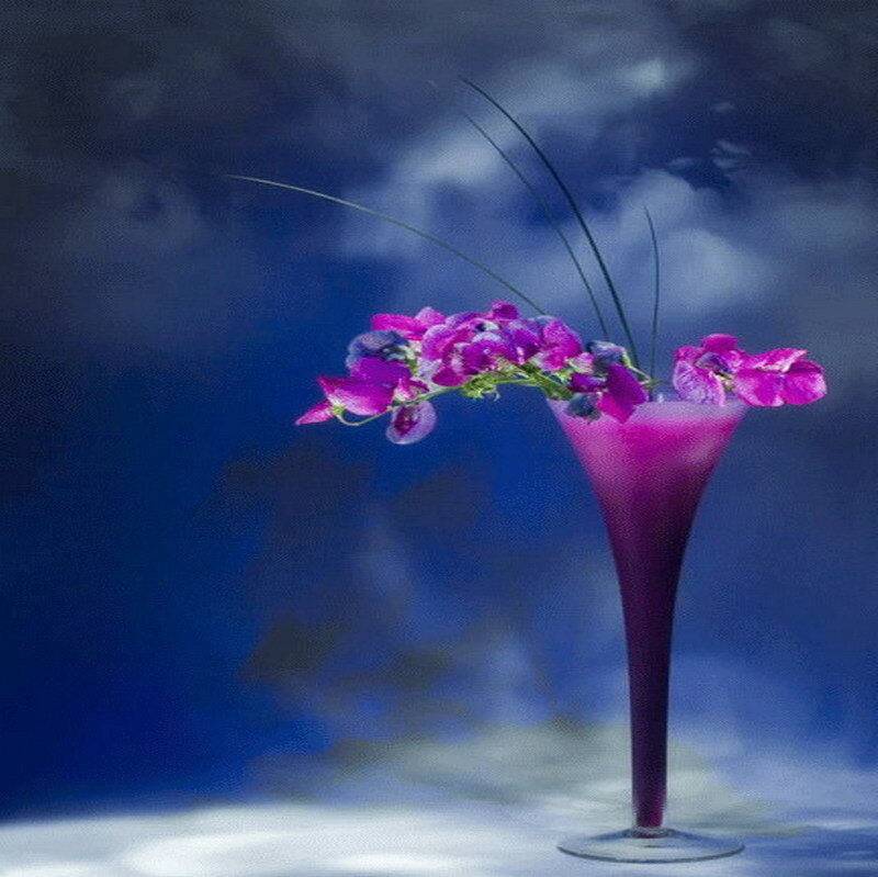Purple cocktail with flowers