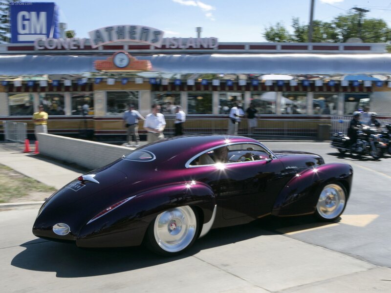 Purple concept car at a show