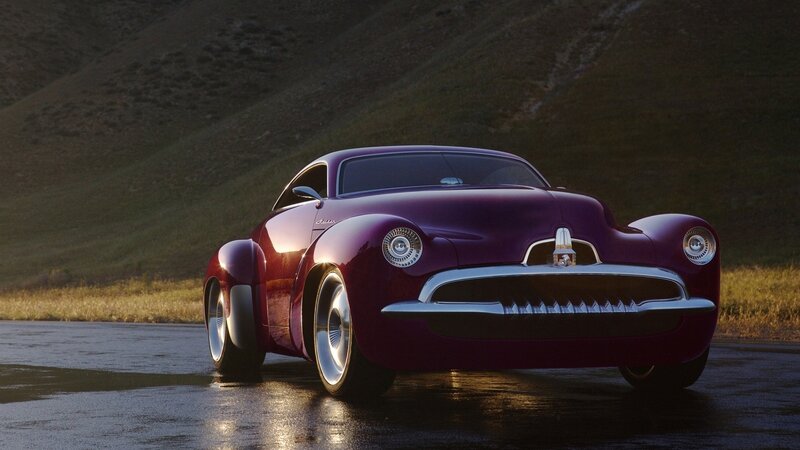 Purple concept car on wet road