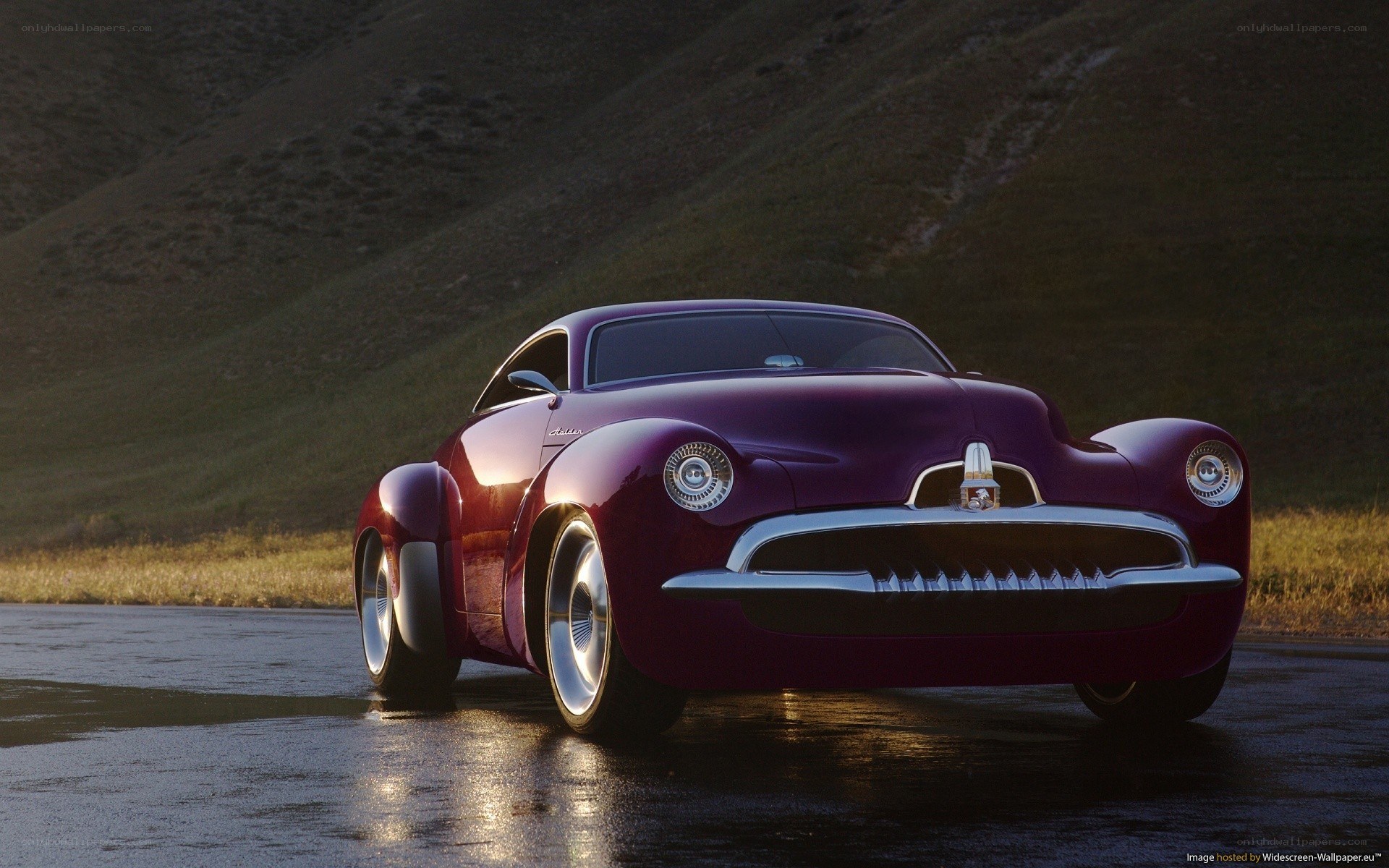 Purple concept car on wet road