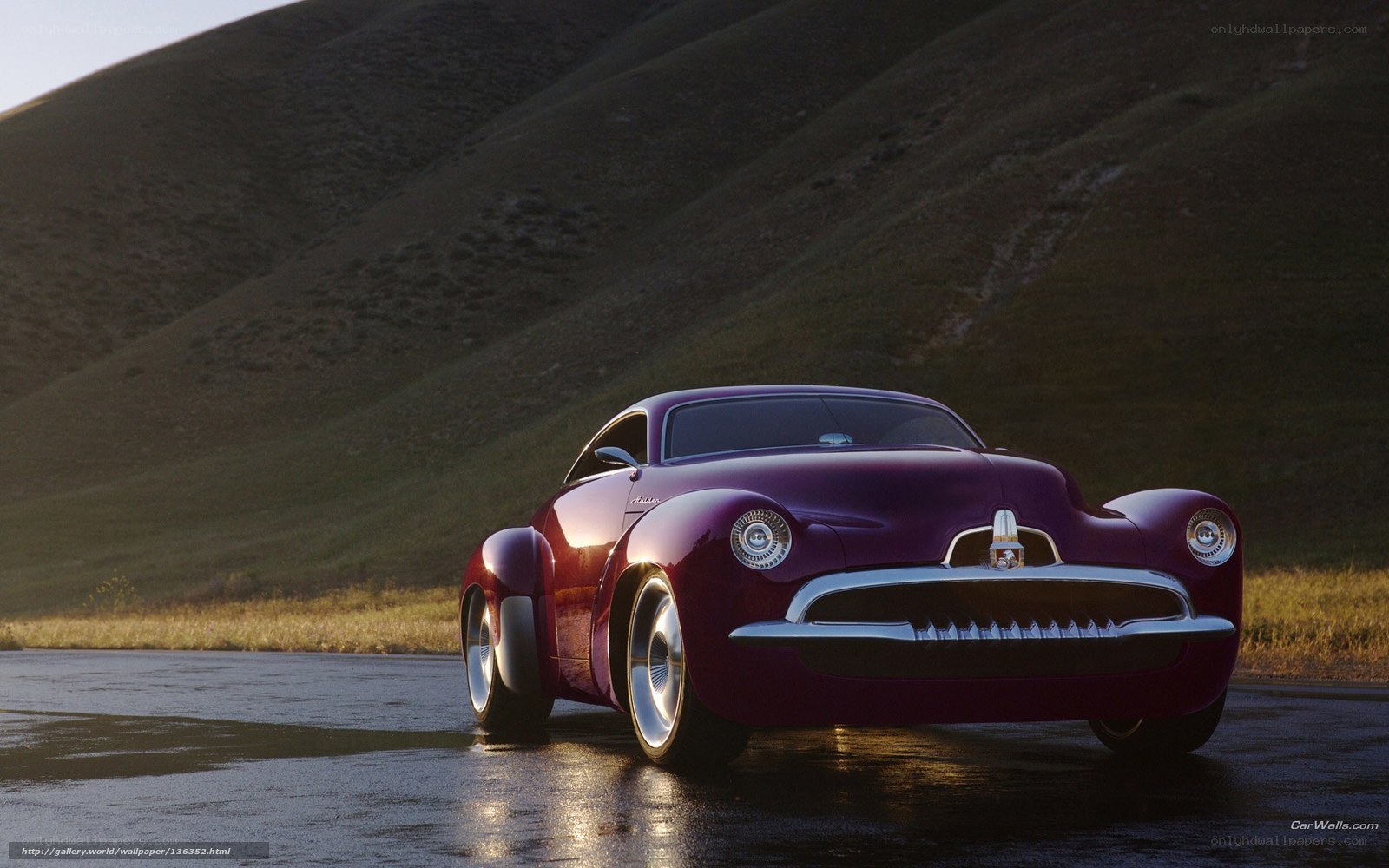 Purple concept car on wet road