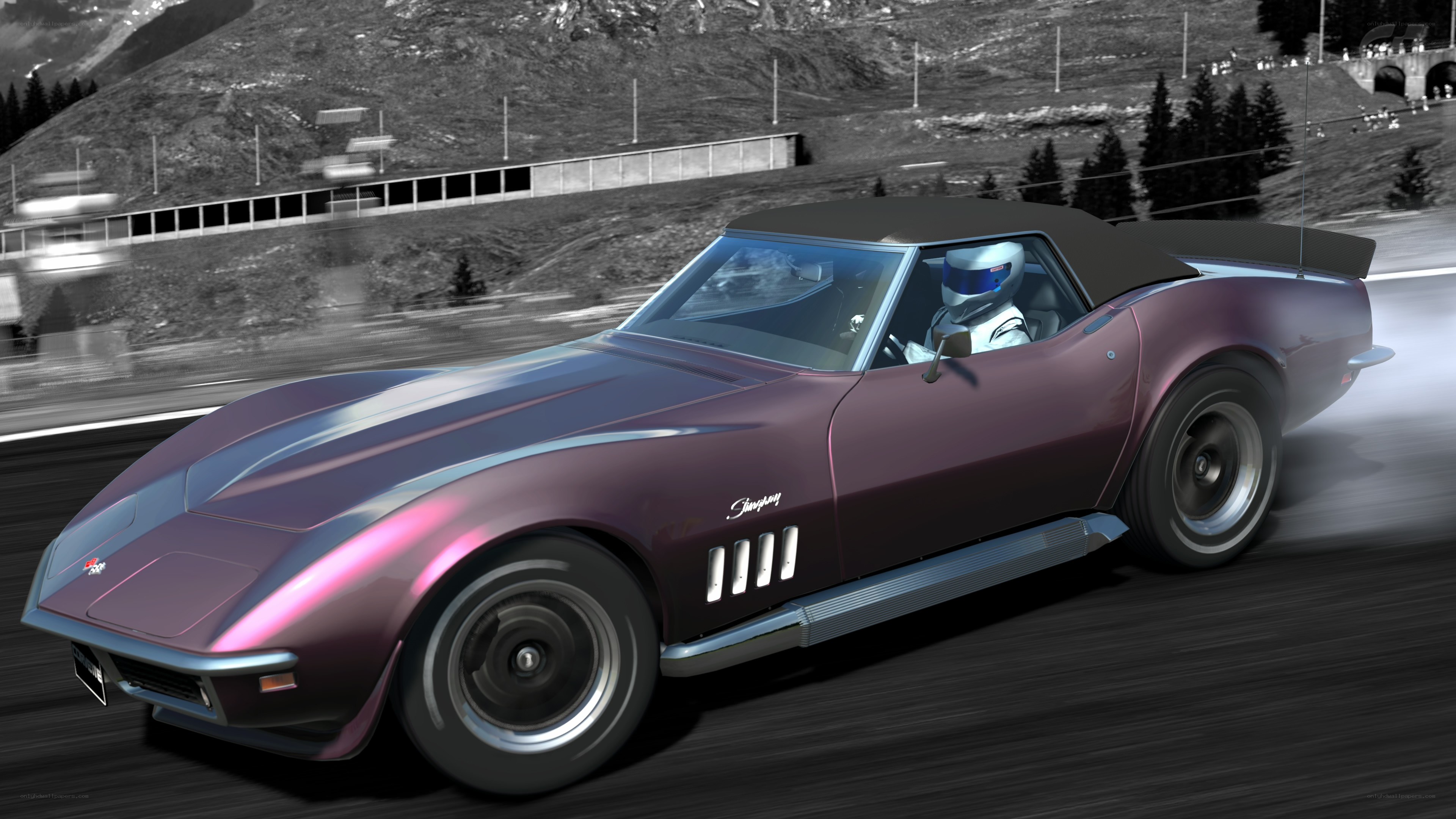 Purple Corvette on a racetrack