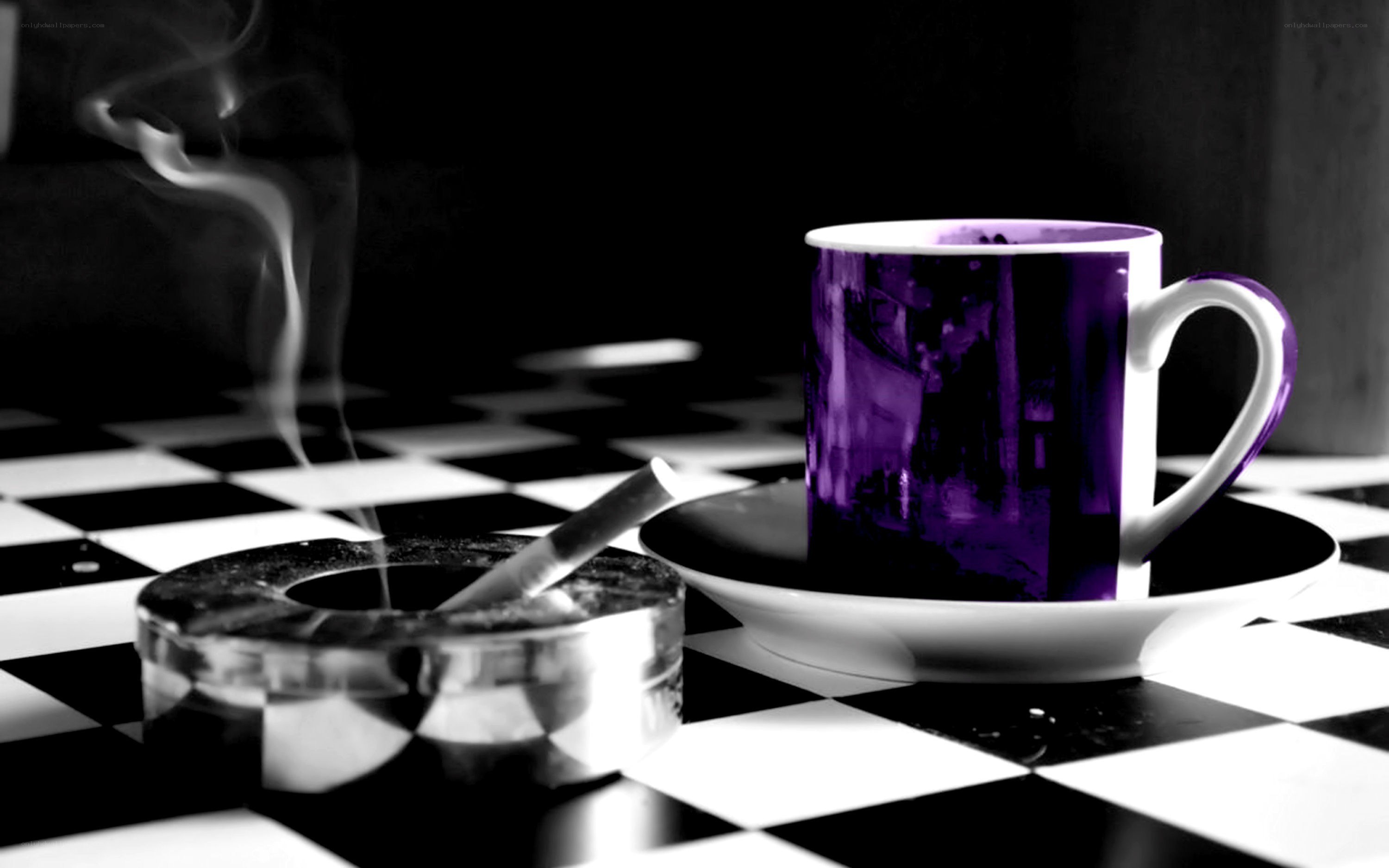 Purple cup on checkerboard