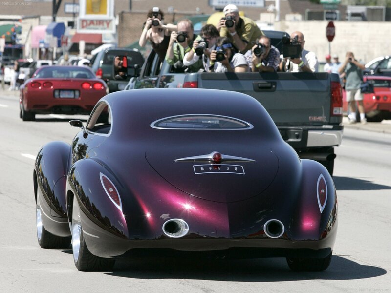 Purple custom car on city street