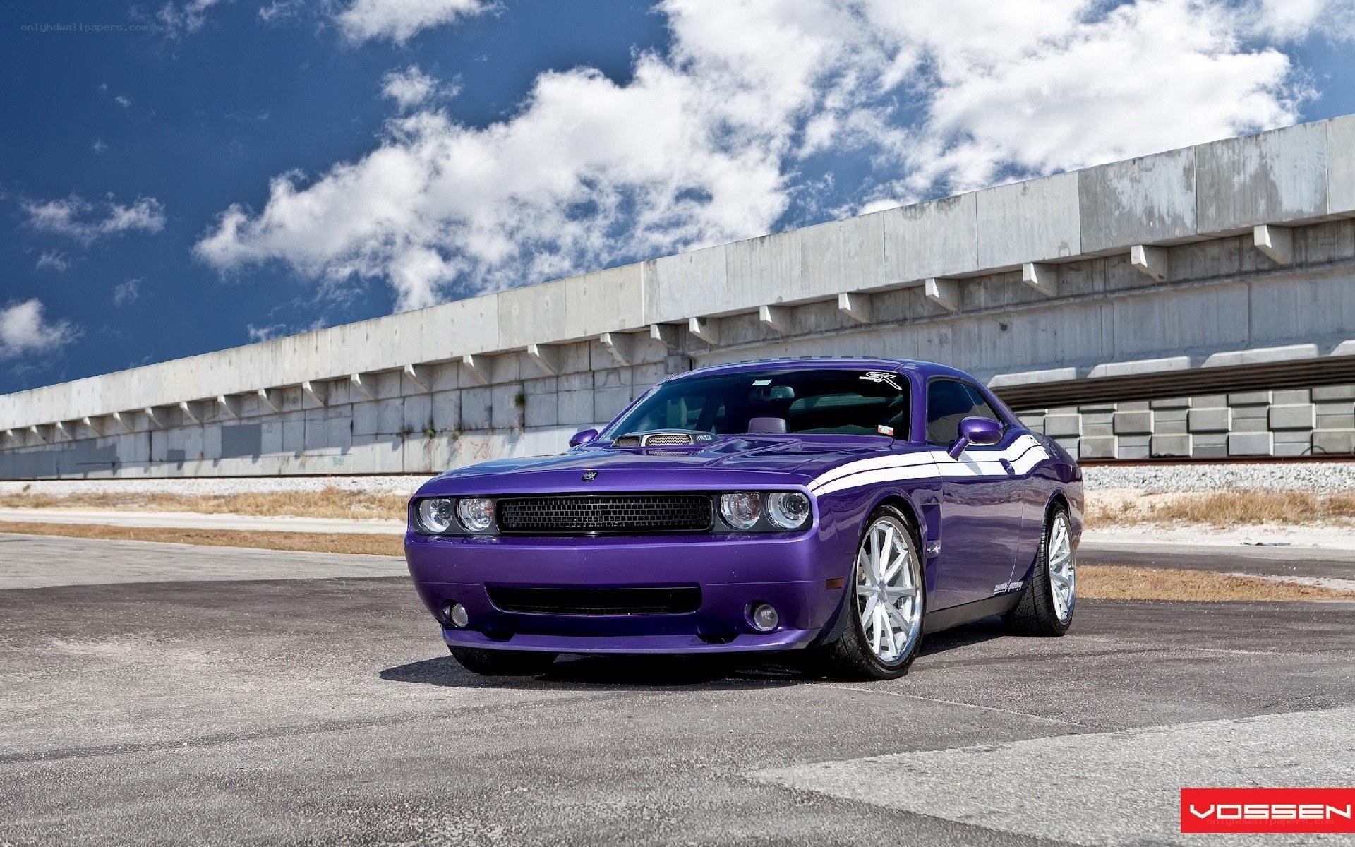 Purple Dodge Challenger on track