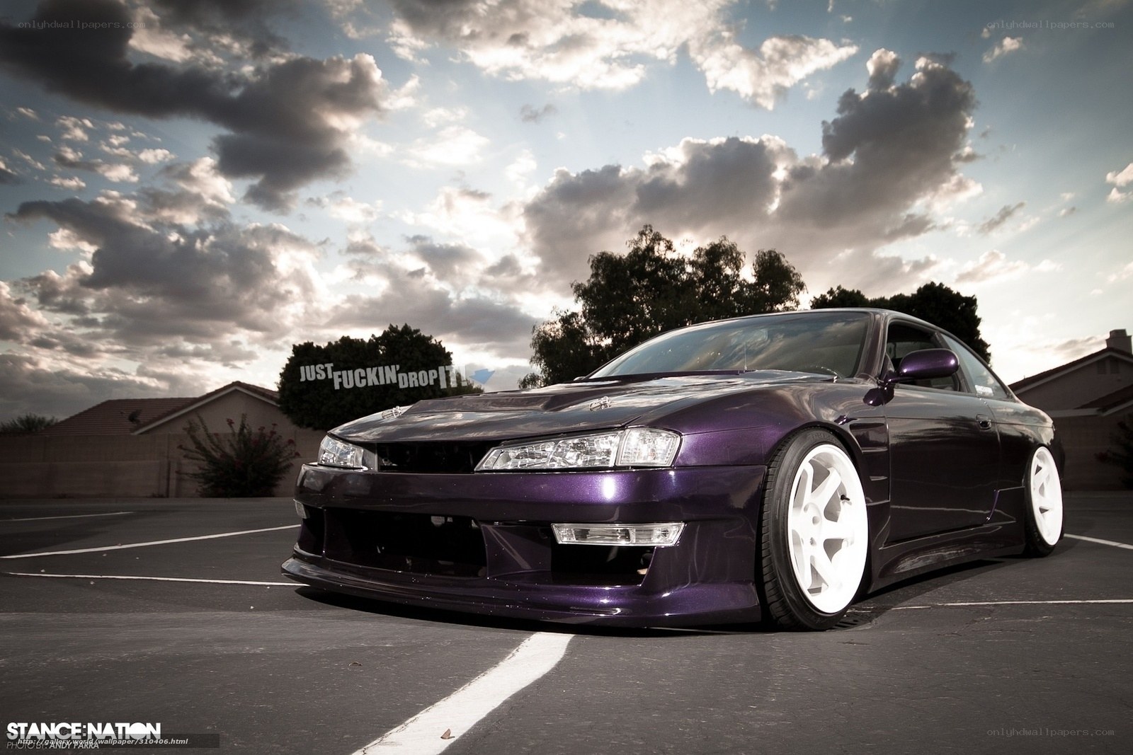purple drift car at sunset
