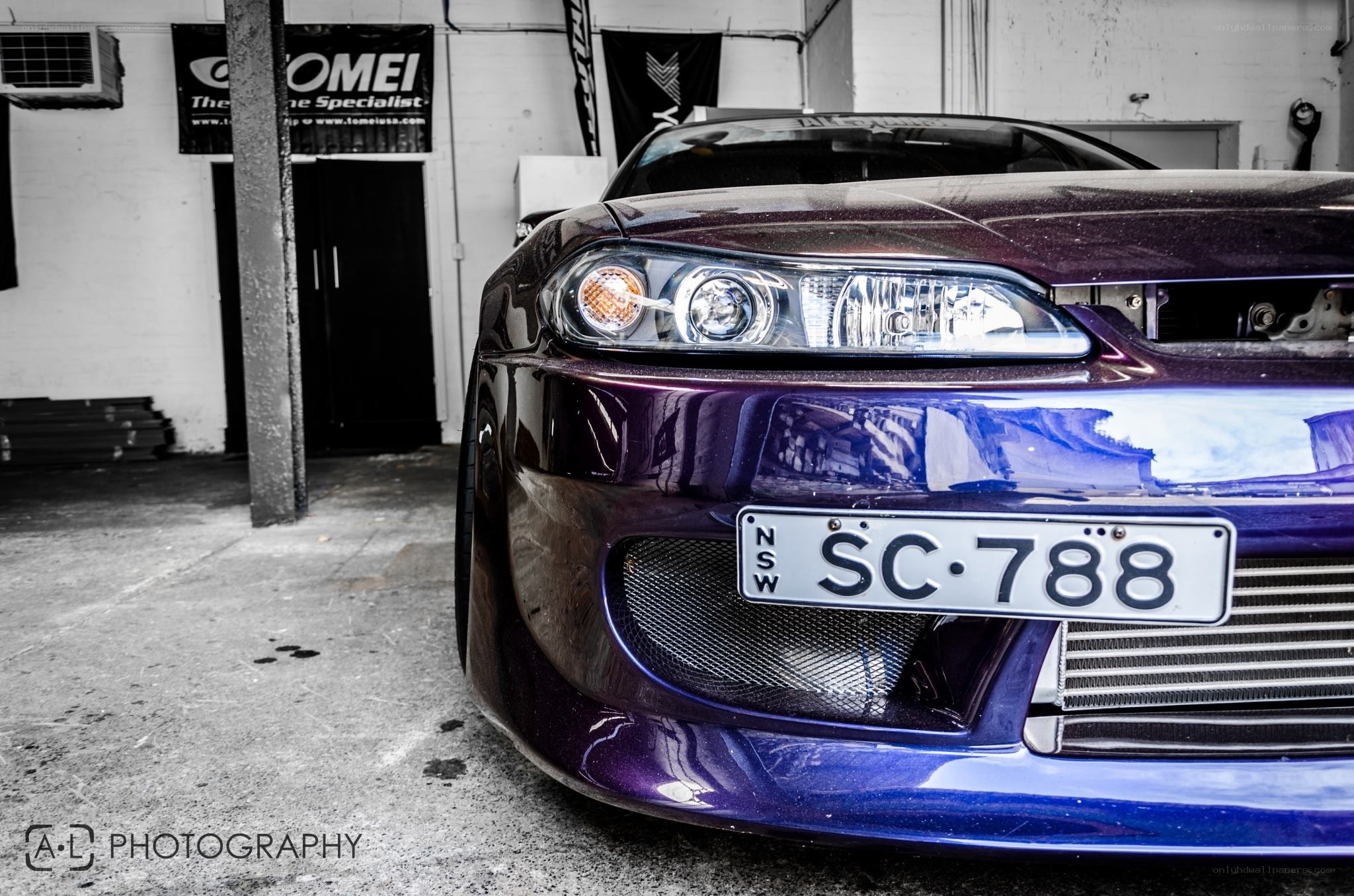 purple drift car in garage