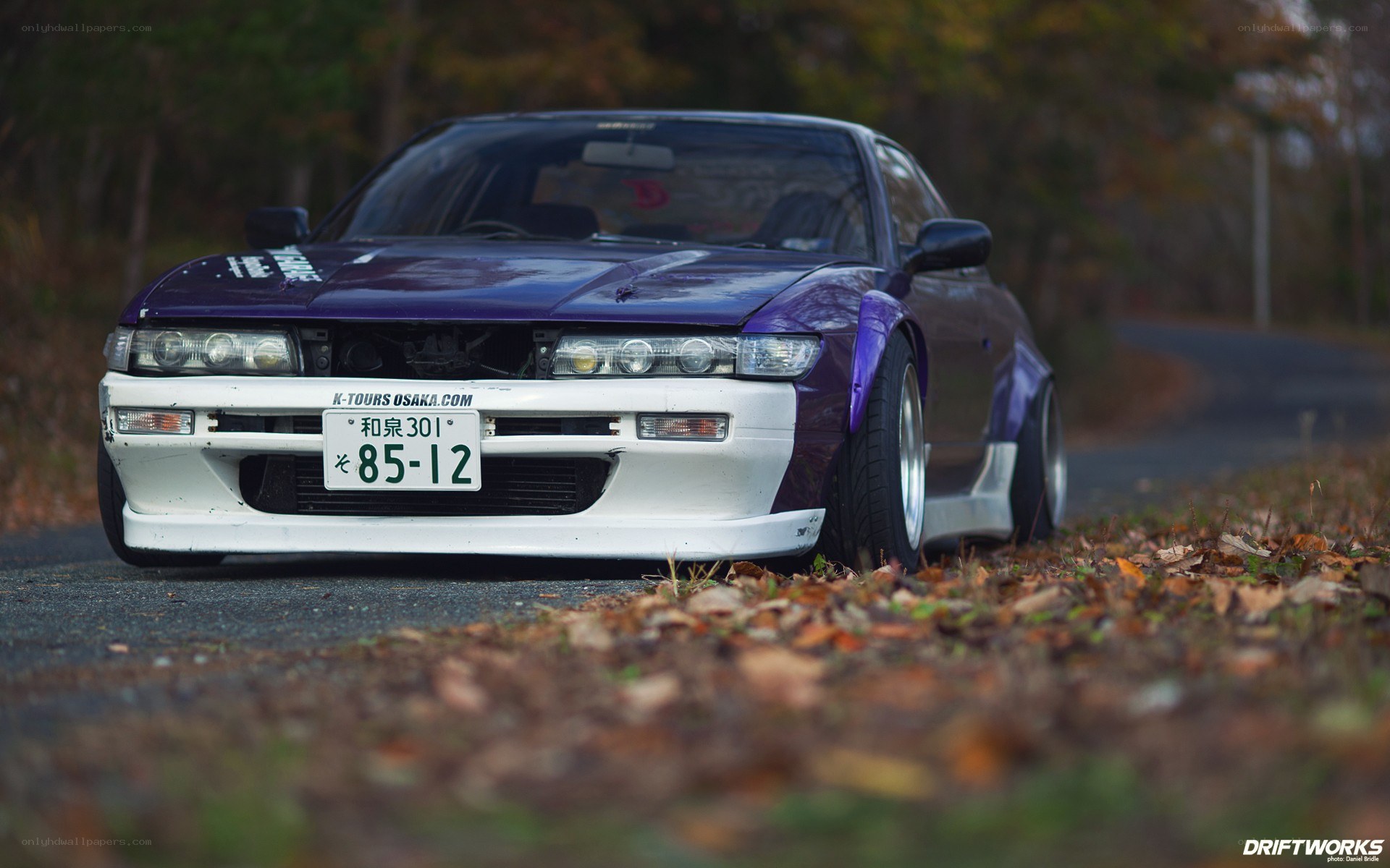 purple drift car on road