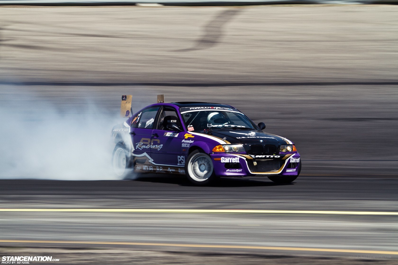 Purple drift car on track